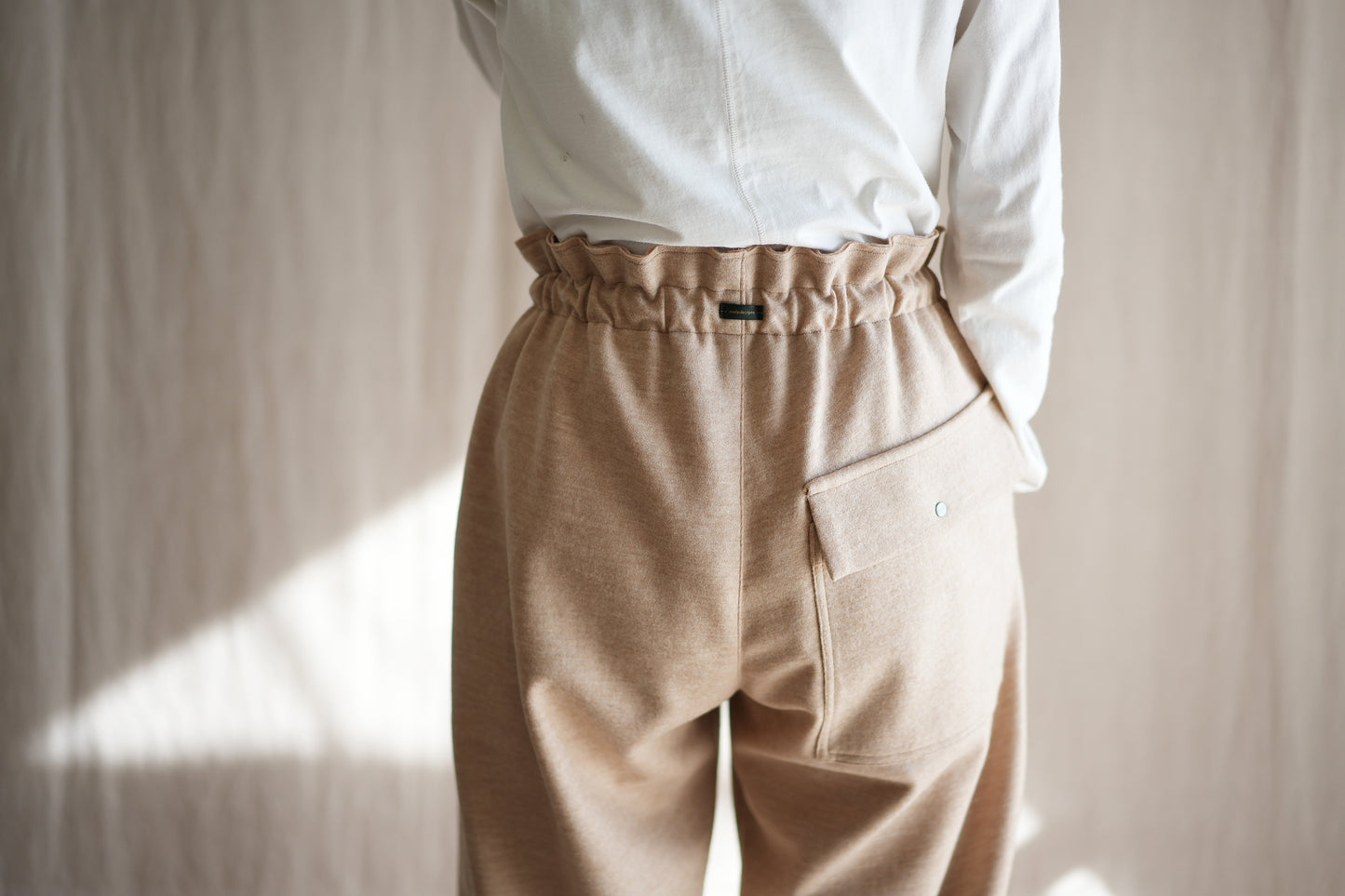 縮絨ウールイージーパンツ/Milled Wool loose-fit pants/Heather Beige