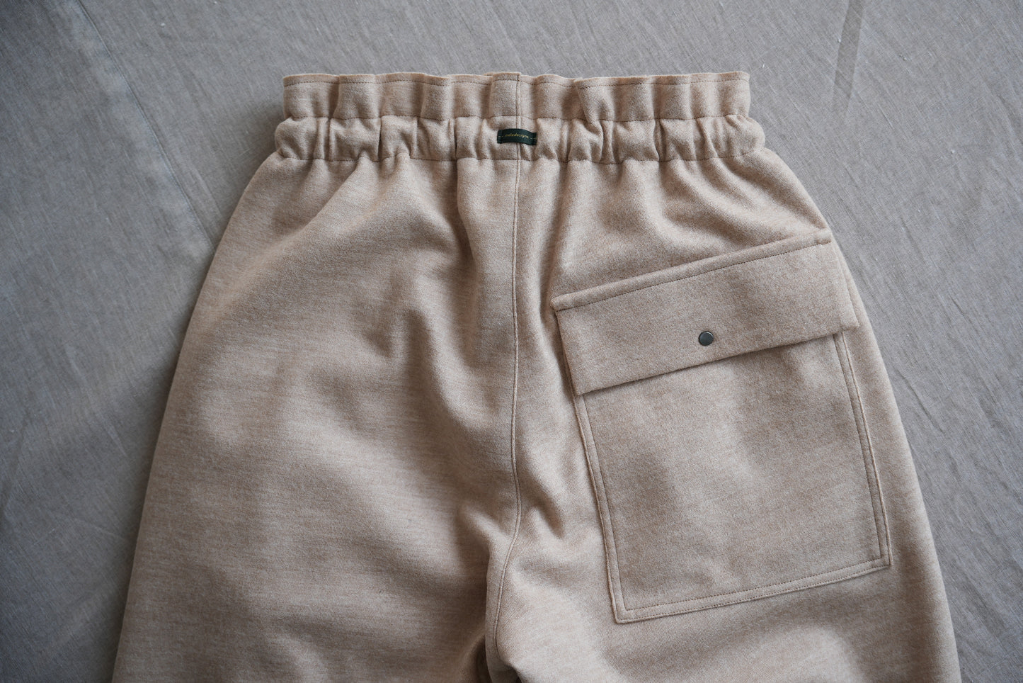 縮絨ウールイージーパンツ/Milled Wool loose-fit pants/Heather Beige